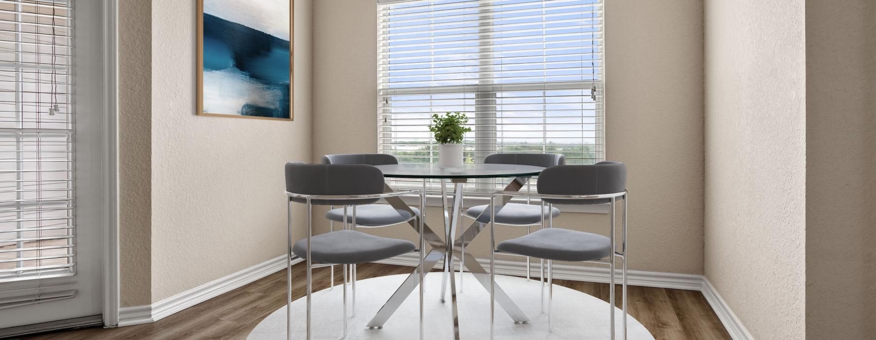 a dining room table with chairs