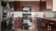 c-shaped kitchen with ample lighting