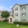 green lawn surround apartment buildings