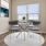 a dining room table with chairs